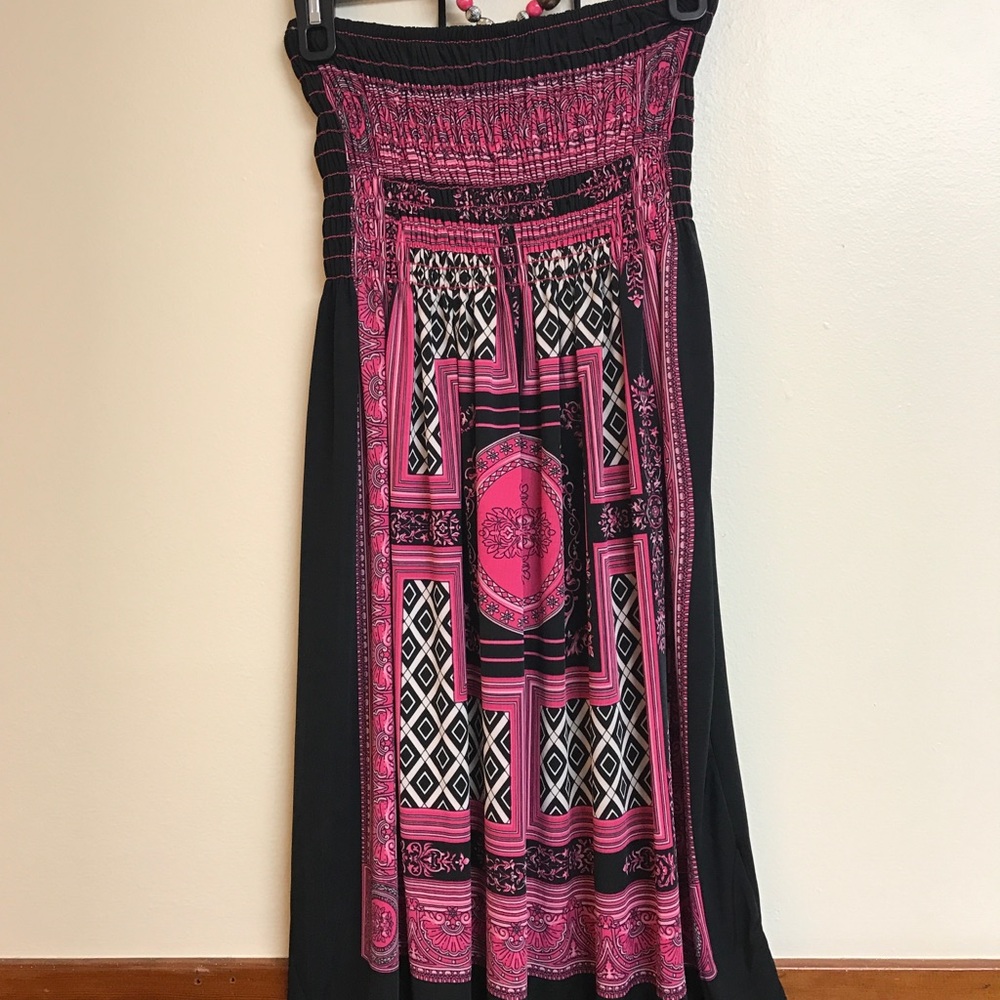 Strapless dress with pull up around neck tie.